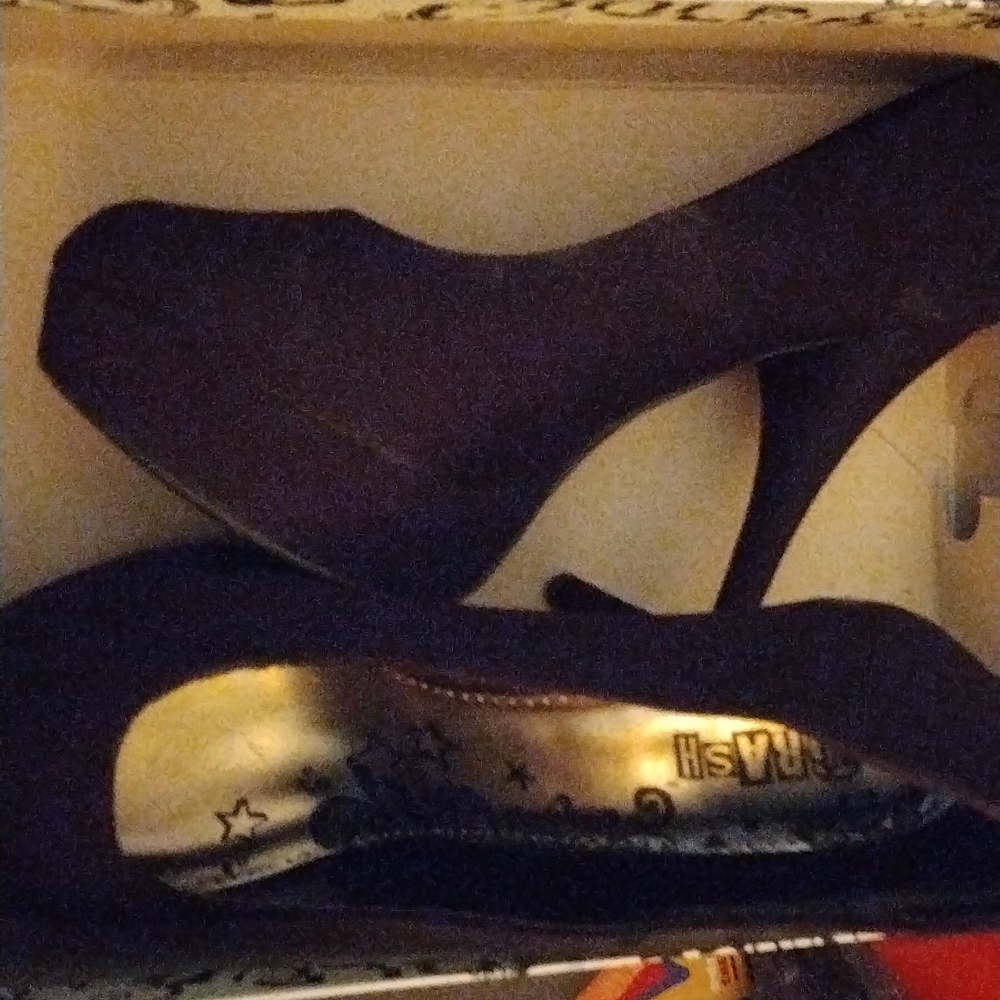 4 inch black velvet heels.